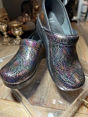 Dansko Black Iridescent Floral-Pattern Clogs
